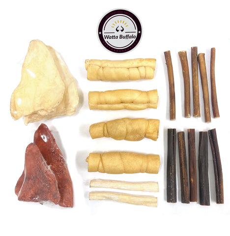 5 Collagen Sticks, 5 Bully Sticks, 2 Natural Pige Ears, 2 Smoked Natural Pige Ears, 2 Beef Bull Tail Chews, and 4 Beef Cheek Rolls.